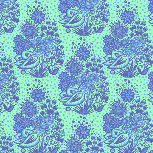 A repeating floral pattern featuring blue stylized flowers, leaves, and dots on a light mint green background.